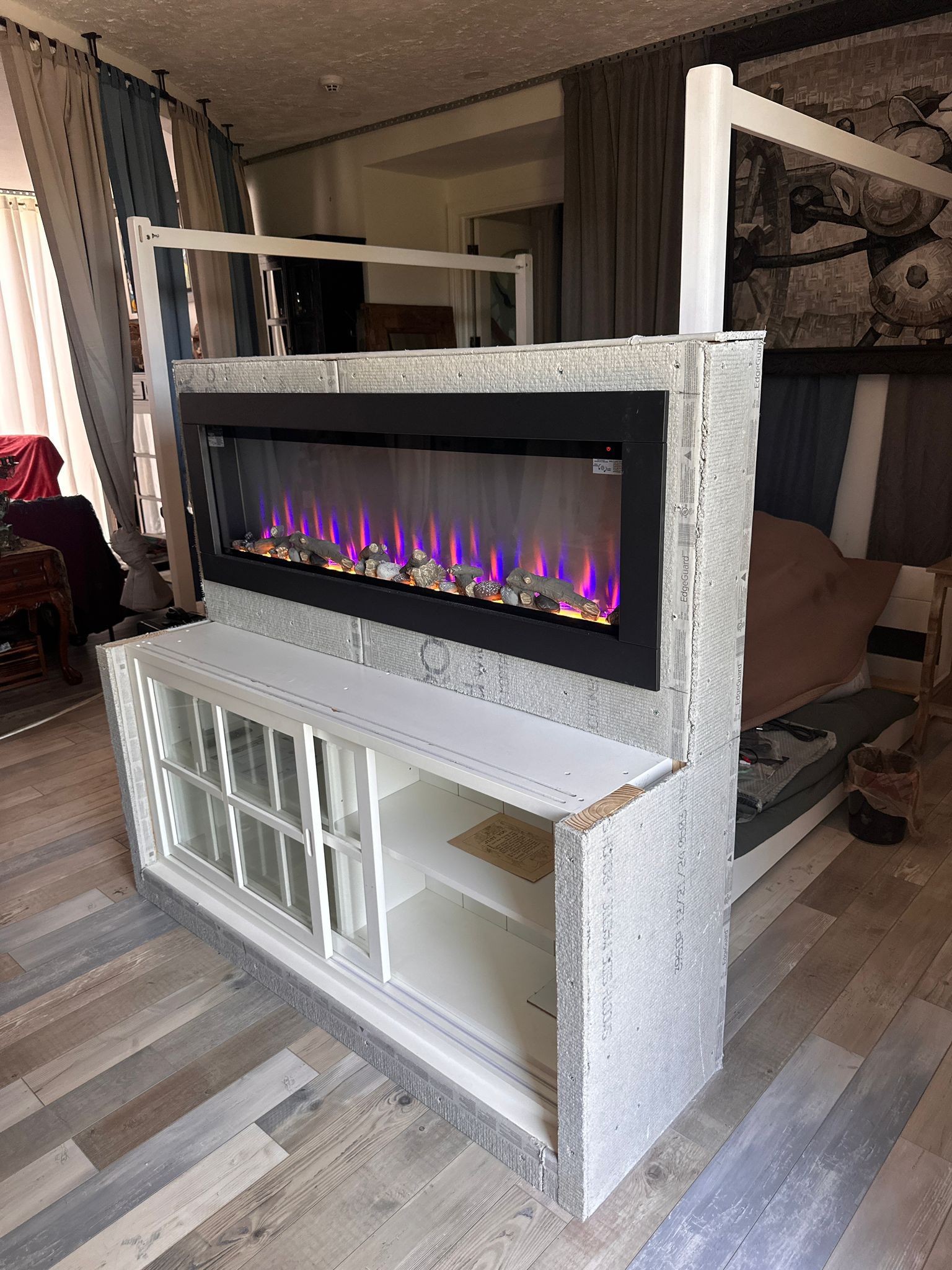 Fireplace with white marble and lighting